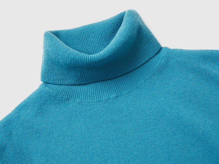 Pull à col roulé en pure laine mérinos couleur papier sucre